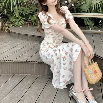法式碎花连衣裙女夏季新款设计感露背系带收腰显瘦短袖茶歇中长裙