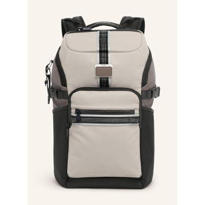 TUMI/途明双肩背包反光材质可调节侧边扣防水隔层便携收纳男用