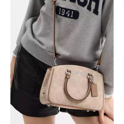 COACH蔻驰单肩包女大容量耐用便携时尚米色经典款简约风格