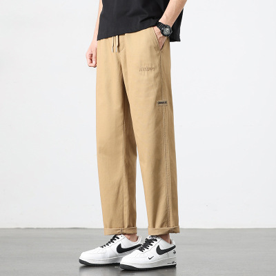 肌理感透气休闲裤男卡其色抽绳锥形裤刺绣小标春夏通勤休闲长裤