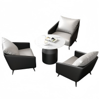 悦兴诚办公沙发一桌三椅套