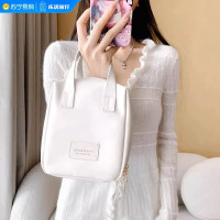 化妆包女2026新款高端便携式外出护肤品收纳出差旅行洗漱超火手提1085