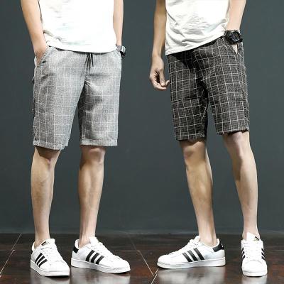 2018夏天新款格子休闲短裤男士加肥大码五分沙滩裤韩版潮流男裤子