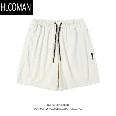 HLCOMAN户外轻薄速干可收纳男士短裤夏季运动宽松透气抽绳五分裤
