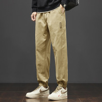 立体拼接休闲裤男卡其色抽绳束脚裤春夏薄款小标装饰透气长裤