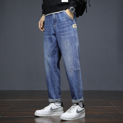 主推款浅蓝水洗拼接牛仔锥形裤男式贴标垂感长裤大码男装