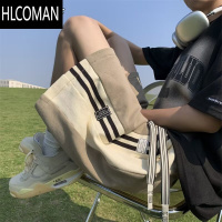 HLCOMAN侧边条纹运动短裤男贴标美式休闲五分裤港风宽松学生夏季沙滩裤薄