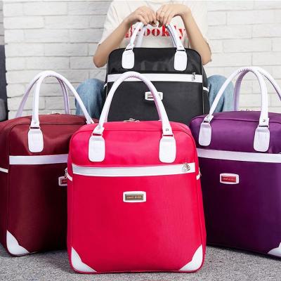 派尼美特网红出门旅行包女手提韩版潮短途可套拉杆大容量轻便黑色小行李袋